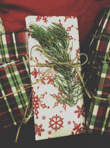 = Get inspired by Pottery Barn and wrap Christmas gifts with simple touches from the Rocky Mountains. Plaid wrapping paper can be found at Hallmark in Harrisville. You kids will have a blast collecting twigs and pinecones to use instead of ribbon and bows. 